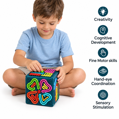 Boy playing with the sensory toy on white with benefit text retained