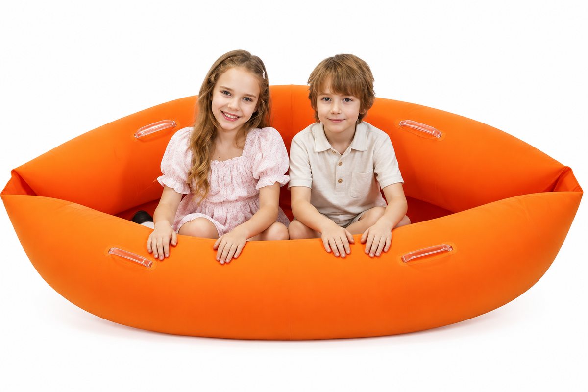Children seated side by side in the orange peapod