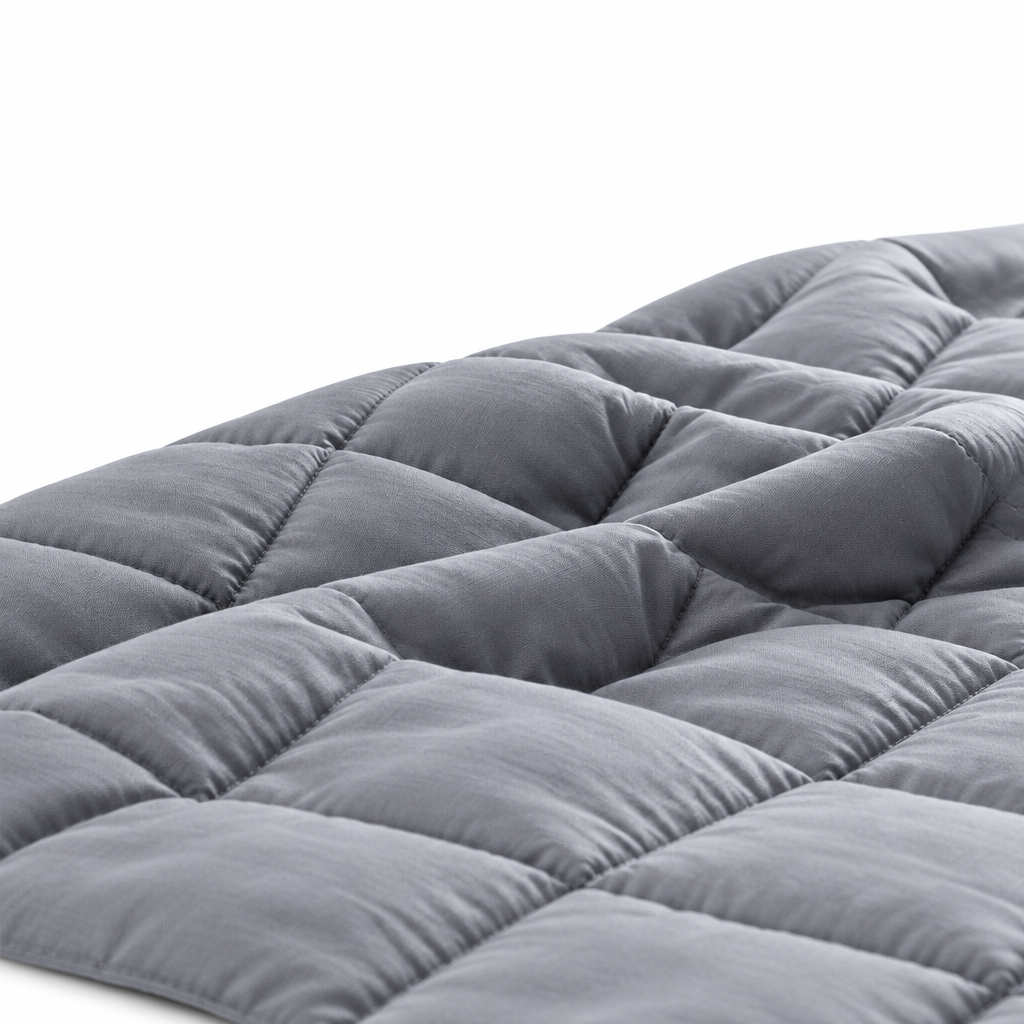 Gray blanket folds on white