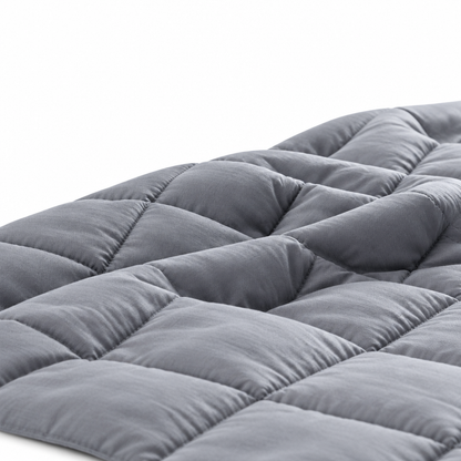 Gray blanket folds on white