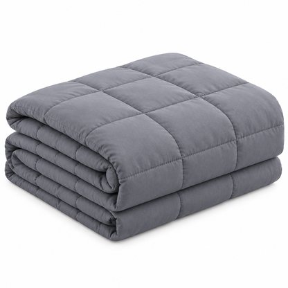 Neatly folded gray blanket, elevated angled view