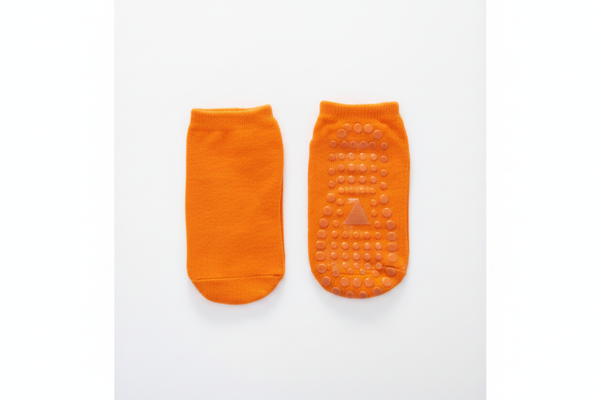 Orange socks on white background