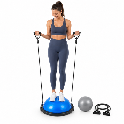 Person using a blue half balance ball trainer with resistance bands on a white background